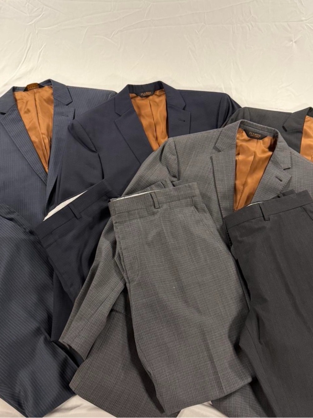 4 Jos A Bank  men’s Suits.